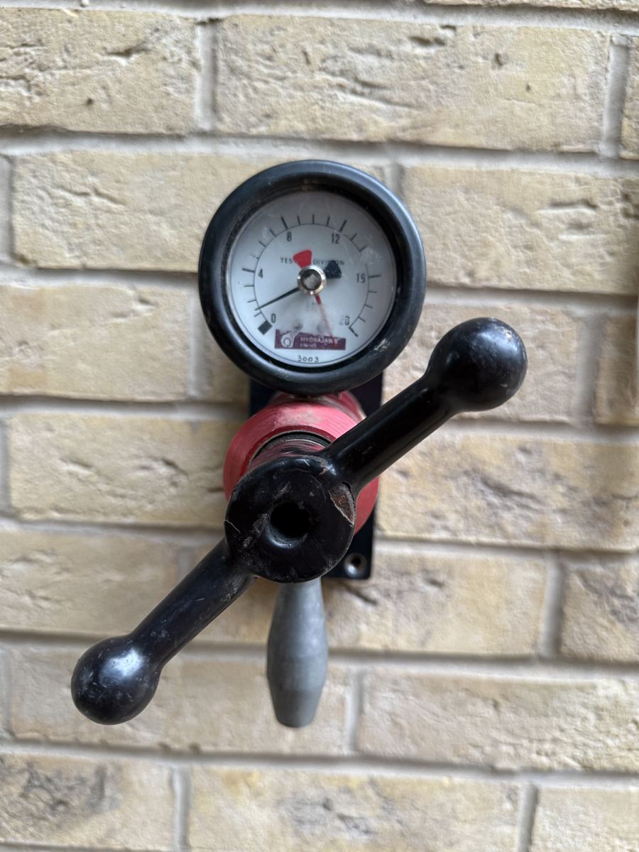Hydrajaws pull-test gauge confirming wall tie installation strength