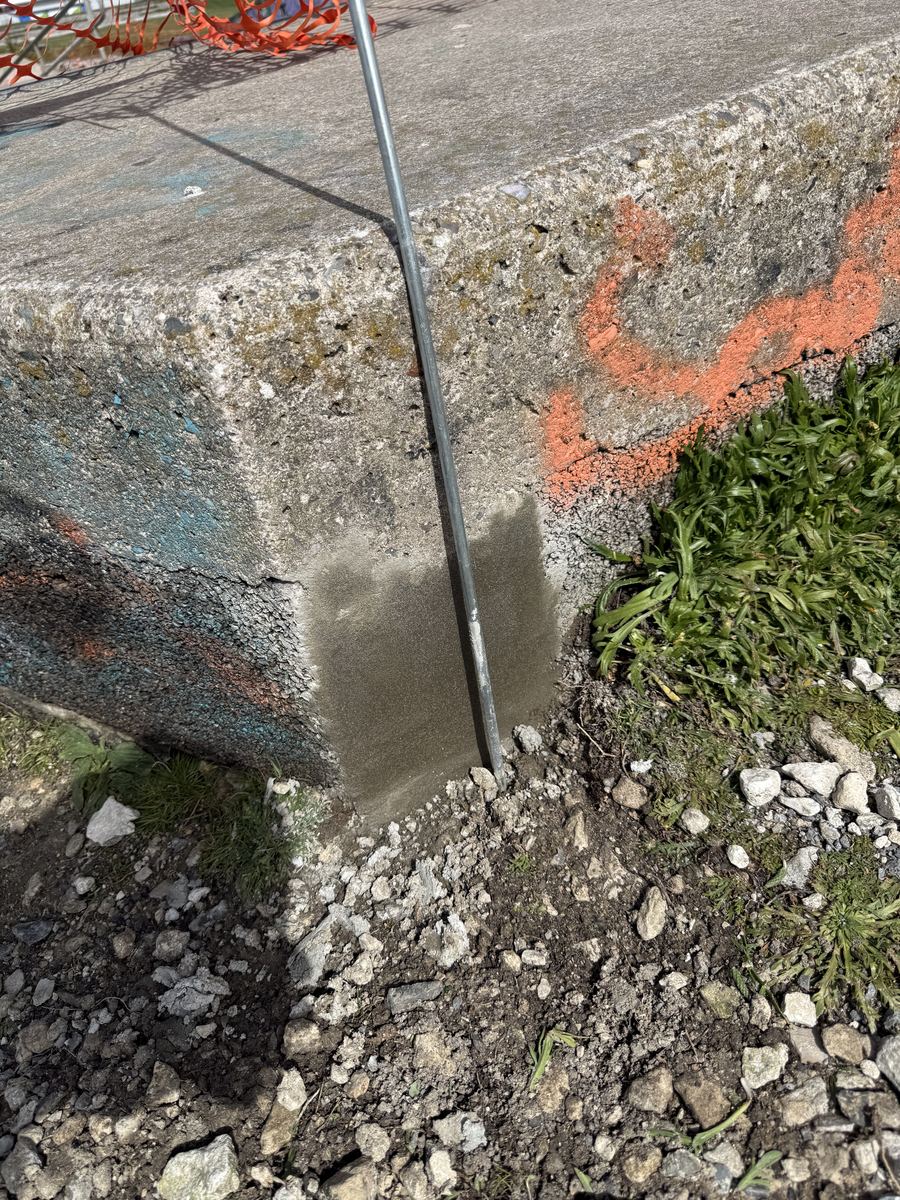 Concrete repair work in progress at a public skatepark