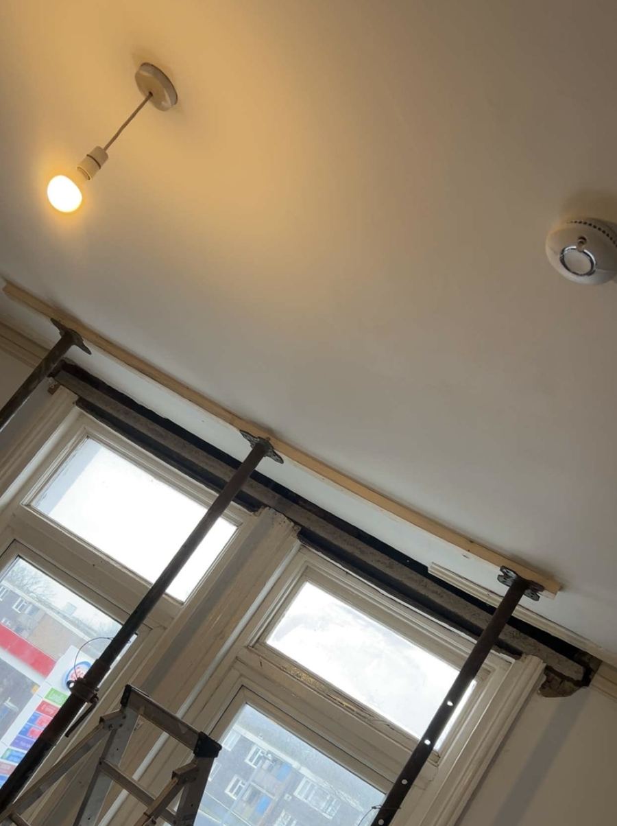 Interior view of propped ceiling during lintel installation, Southampton